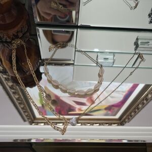 Gold Layered Necklace Set with Shell Accent Paper Clip